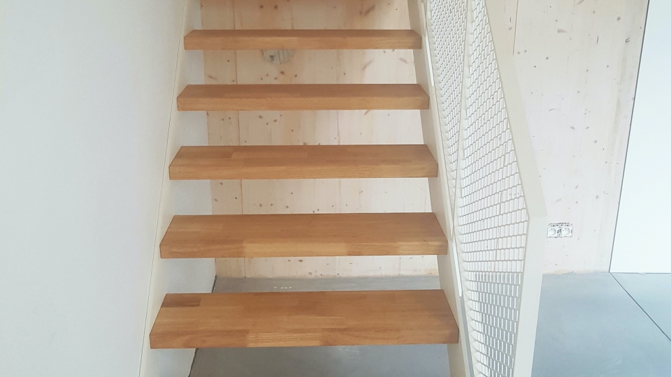 Op maat gemaakte trap en leuning